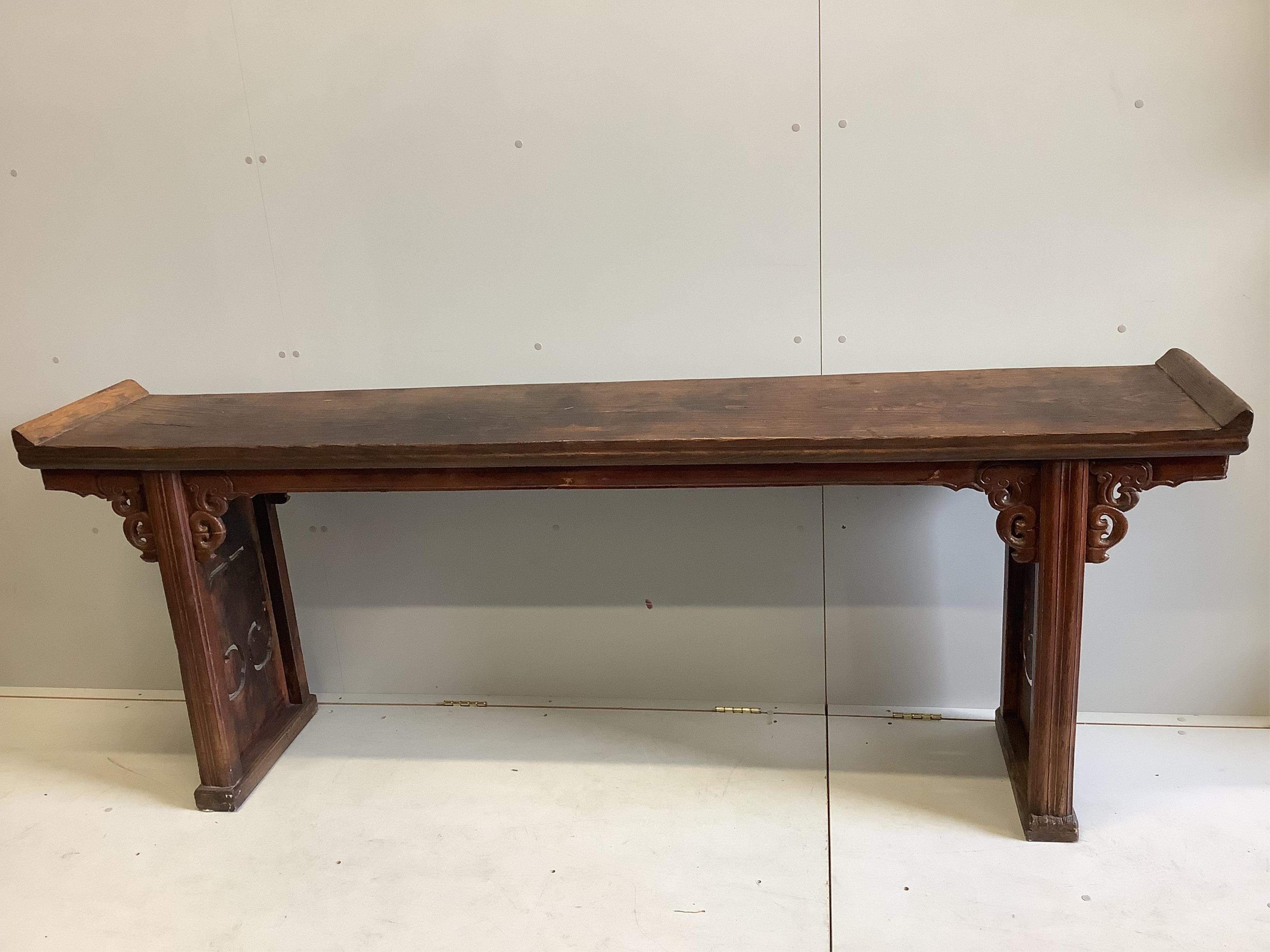 A Chinese elm altar table, width 226cm, depth 41cm, height 87cm. Condition - fair